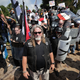 White nationalists, neo-Nazis and members of the ‘alt-right’ exchange insluts with counter-protesters as they attempt to guard the entrance to Emancipation Park during the ‘Unite the Right’ rally August 12, 2017 in Charlottesville, Virginia.
